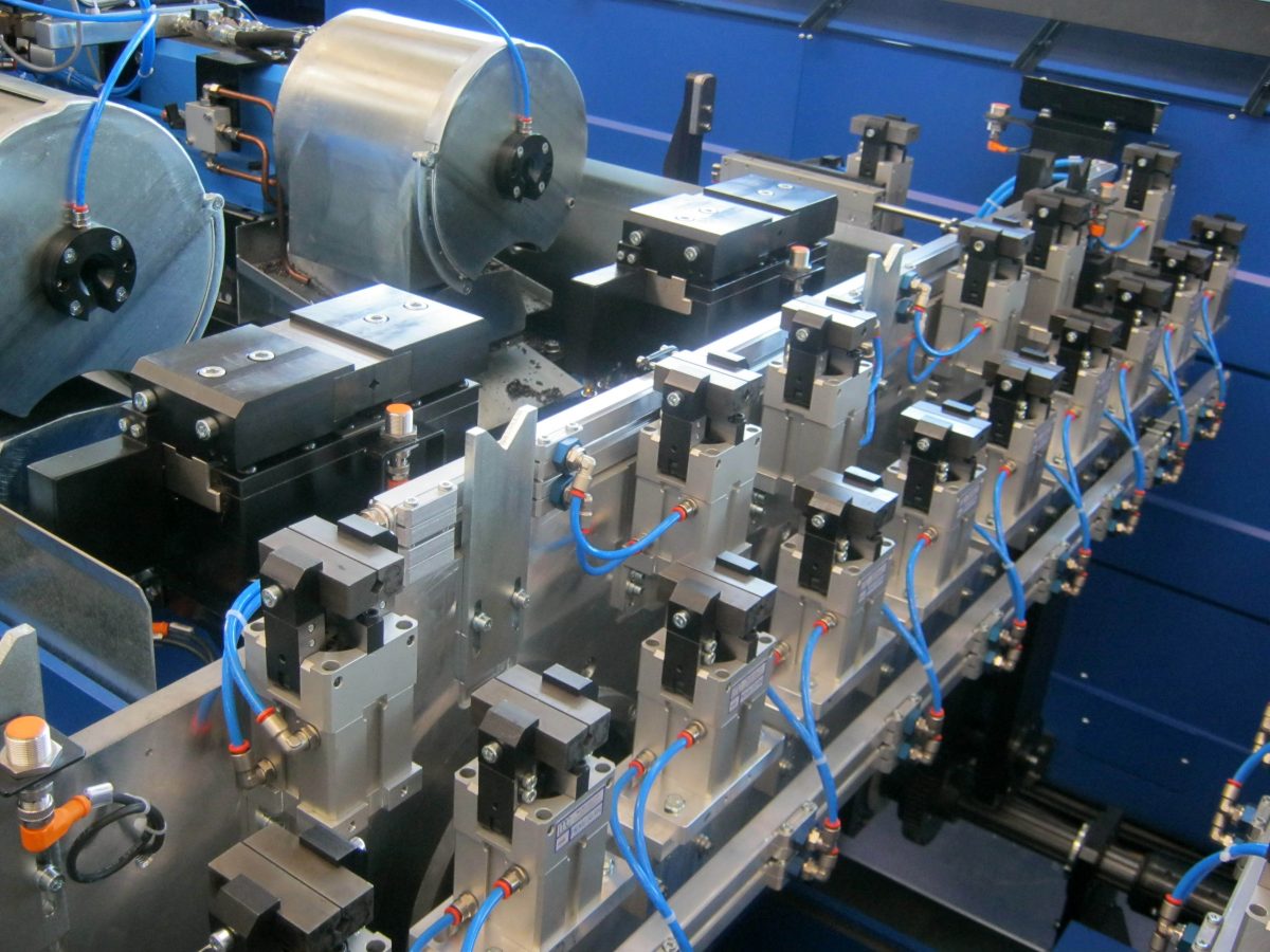 img Sistema di trasferimento a pinza