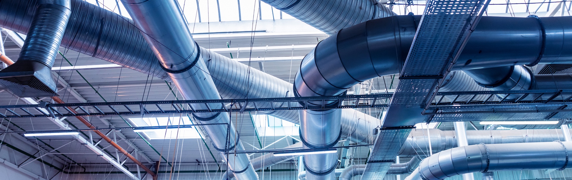 Air conditioning of buildings. Background of ventilation pipes. Laying of engineering networks.